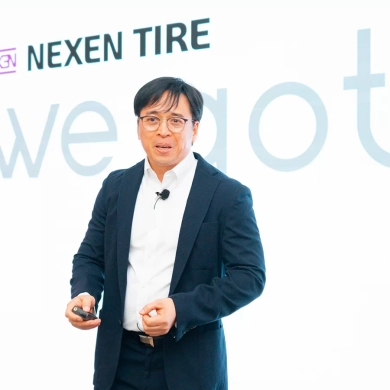 Representative from China addressing Nexen Tire customer meet 2023